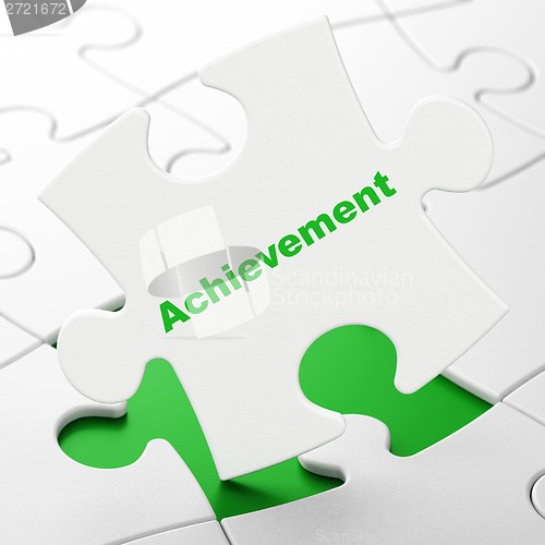 Image of Education concept: Achievement on puzzle background