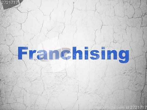 Image of Finance concept: Franchising on wall background