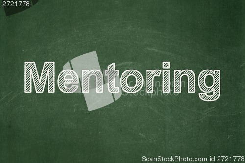 Image of Education concept: Mentoring on chalkboard background