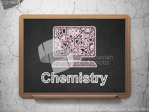 Image of Education concept: Computer Pc and Chemistry on chalkboard background