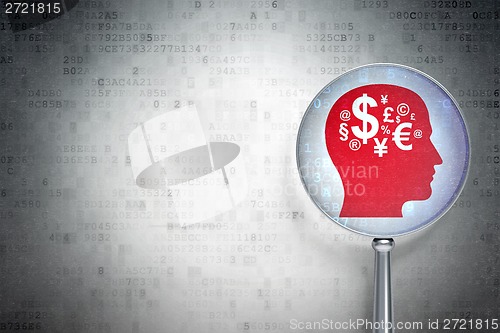 Image of Marketing concept:  Head With Finance Symbol with optical glass on digital background