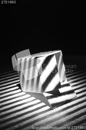 Image of empty box in the dark night (light effect)