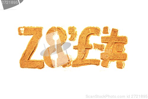 Image of alphabet and numbers from the sand 