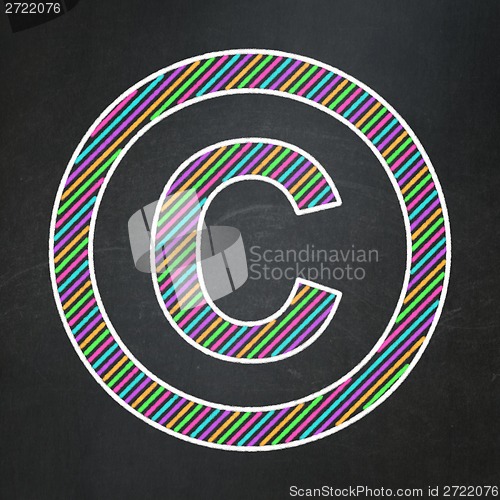 Image of Law concept: Copyright on chalkboard background