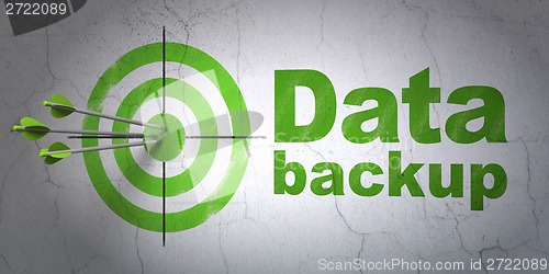 Image of Information concept: target and Data Backup on wall background