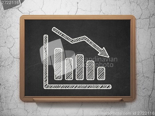 Image of Advertising concept: Decline Graph on chalkboard background
