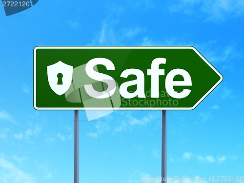 Image of Safety concept: Safe and Shield With Keyhole on road sign background