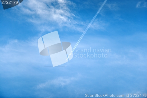 Image of Tranquil sky with airplane traveling