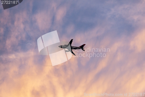 Image of Tranquil sky with airplane traveling