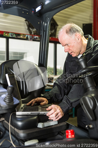 Image of man with a laptop