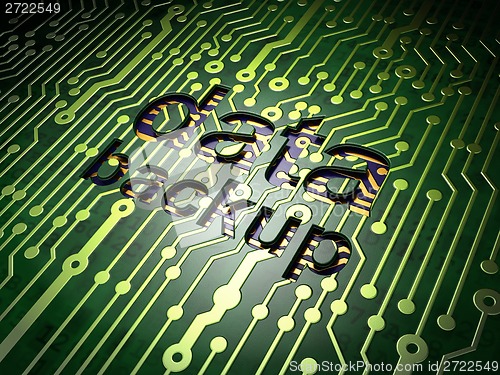 Image of Information concept: Data Backup on circuit board background