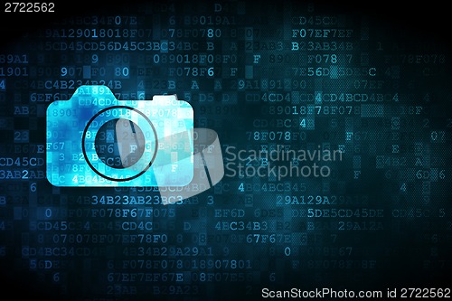 Image of Vacation concept: Photo Camera on digital background