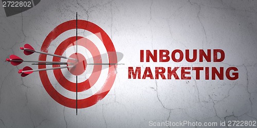 Image of Business concept: target and Inbound Marketing on wall background