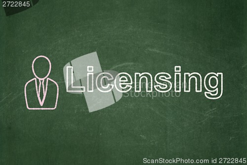 Image of Law concept: Business Man and Licensing on chalkboard background