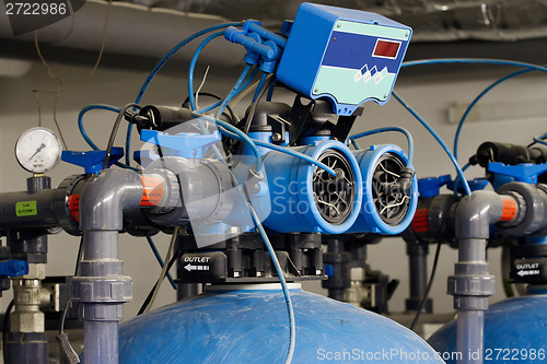 Image of Water filters to remove iron, together with tanks