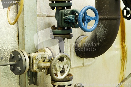 Image of Steam pipes with pressure relief valves