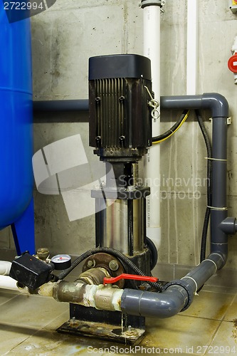 Image of Water pipes in the boiler room and electric motors