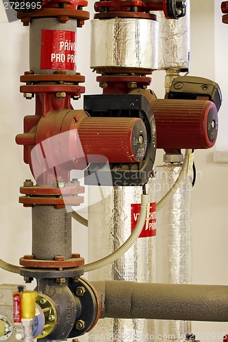 Image of Hot water and steam pipes with pumps