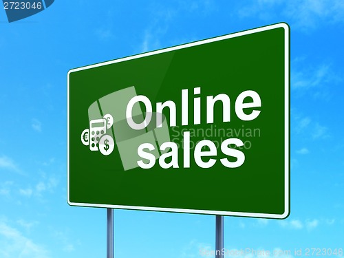 Image of Advertising concept: Online Sales and Calculator on road sign background