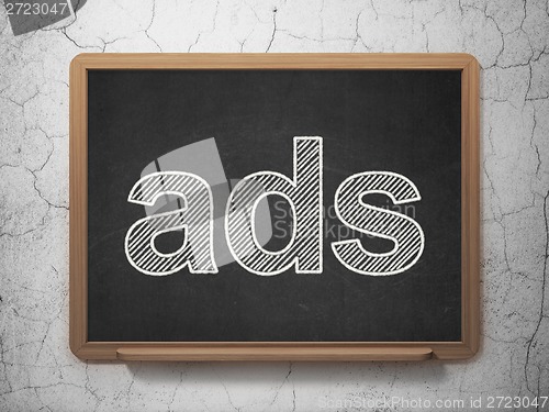 Image of Advertising concept: Ads on chalkboard background