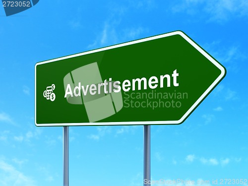 Image of Marketing concept: Advertisement and Calculator on road sign background