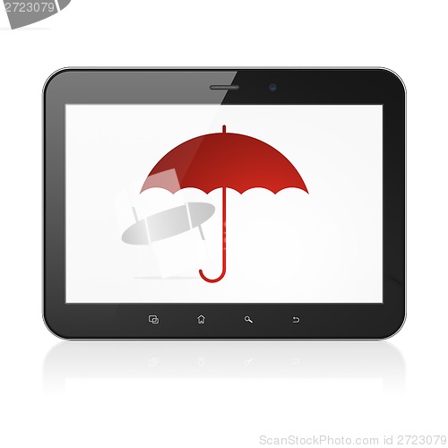 Image of Privacy concept: Umbrella on tablet pc computer