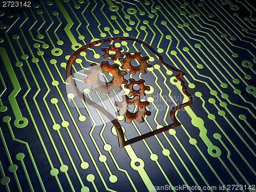 Image of Education concept: Head With Gears on circuit board background