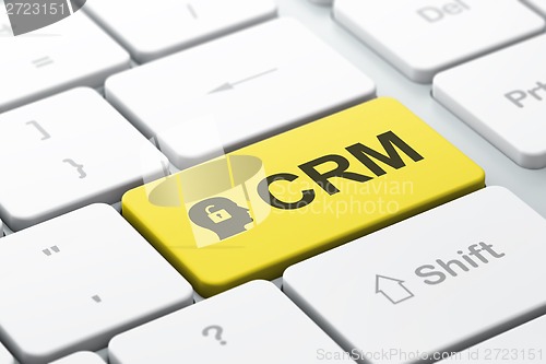 Image of Business concept: Head With Padlock and CRM on keyboard