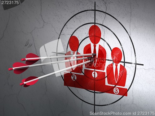 Image of Marketing concept: arrows in Business Team target on wall background