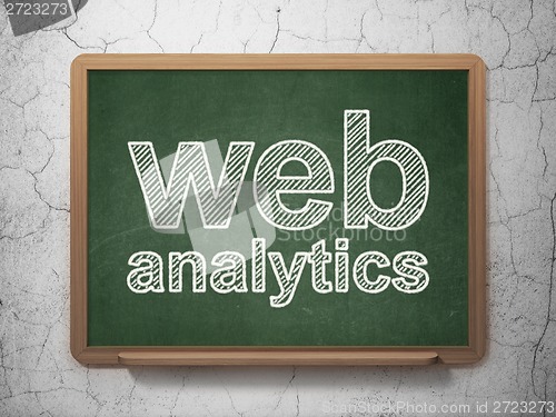 Image of Web design concept: Web Analytics on chalkboard background