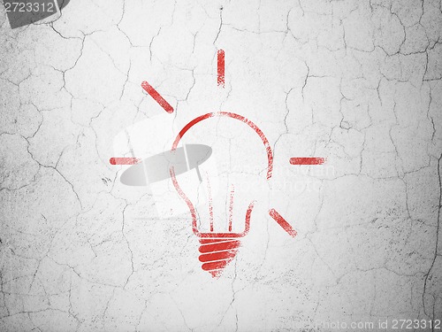 Image of Finance concept: Light Bulb on wall background