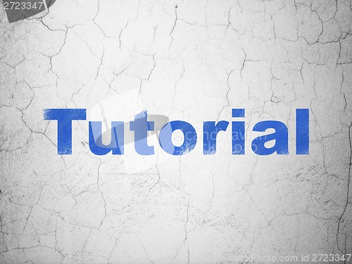 Image of Education concept: Tutorial on wall background