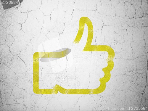 Image of Social network concept: Thumb Up on wall background