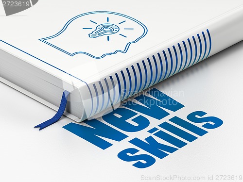 Image of Education concept: book Head With Lightbulb, New Skills on white background
