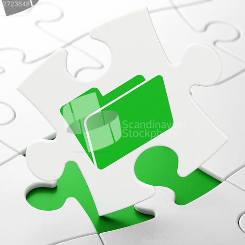 Image of Business concept: Folder on puzzle background