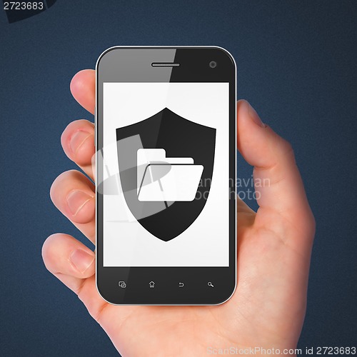 Image of Finance concept: Folder With Shield on smartphone