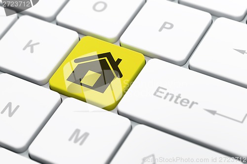 Image of Business concept: Home on computer keyboard background