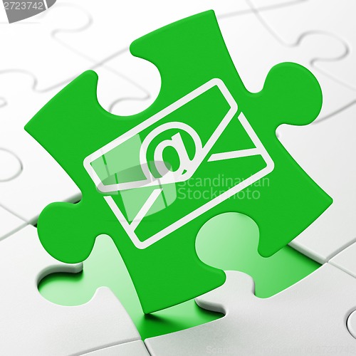 Image of Business concept: Email on puzzle background