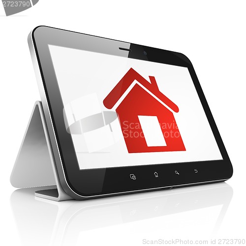 Image of Finance concept: Home on tablet pc computer