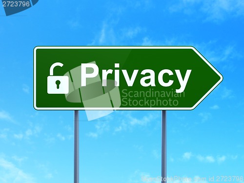 Image of Protection concept: Privacy and Opened Padlock on road sign background