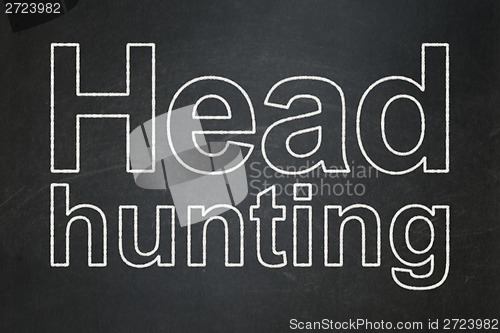 Image of Finance concept: Head Hunting on chalkboard background