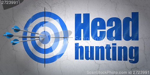 Image of Business concept: target and Head Hunting on wall background