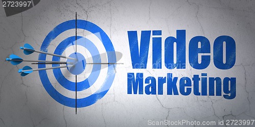 Image of Business concept: target and Video Marketing on wall background