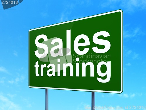 Image of Marketing concept: Sales Training on road sign background