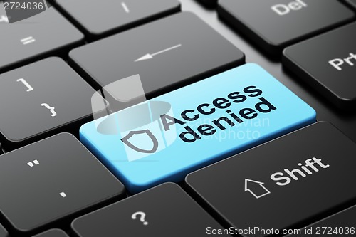 Image of Security concept: Contoured Shield and Access Denied on keyboard