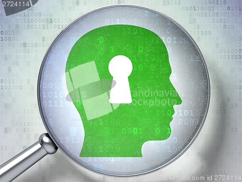Image of Information concept: Head Keyhole with optical glass on digital background