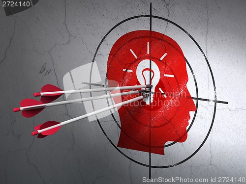 Image of Marketing concept: arrows in Head With Light Bulb target