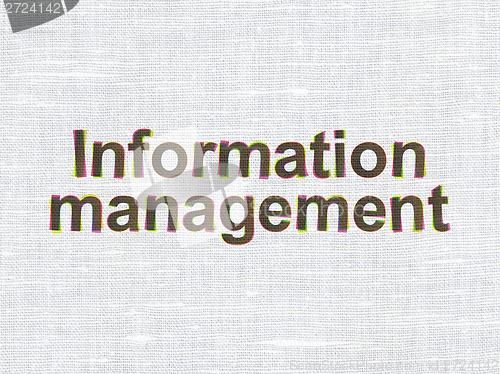 Image of Information Management on fabric texture background