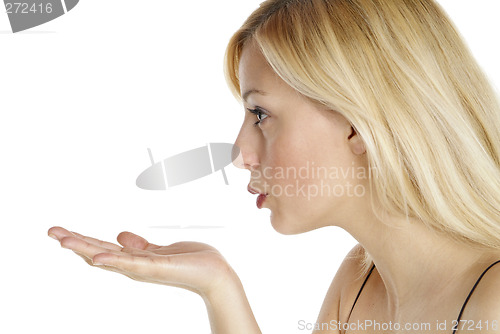 Image of blowing woman