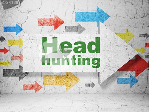 Image of Business concept: arrow with Head Hunting on grunge wall background